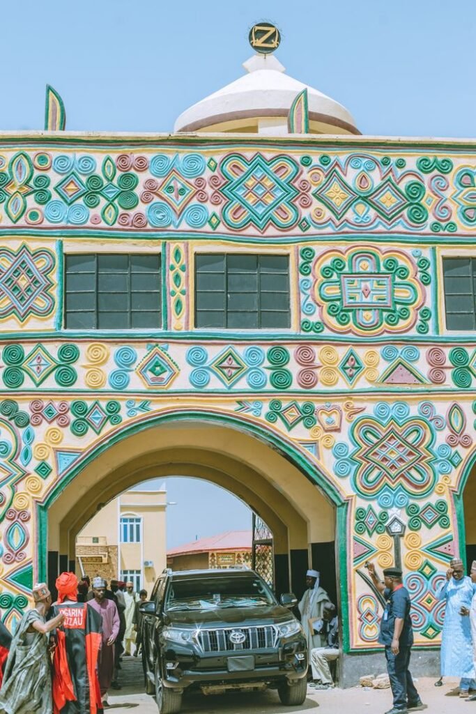 Colorful facade of Zaria Emir's Palace, Nigeria, showcasing traditional architectural design.